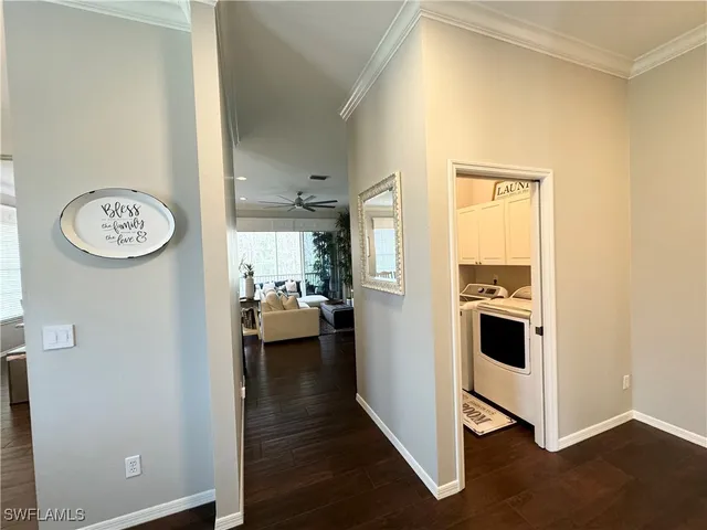 a view of a kitchen from the hallway