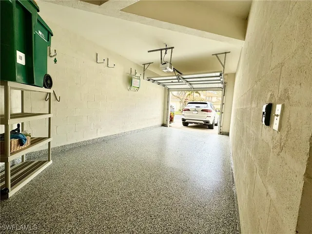 a view of a hallway view with staircase