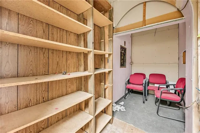 a bathroom with a sink toilet and mirror