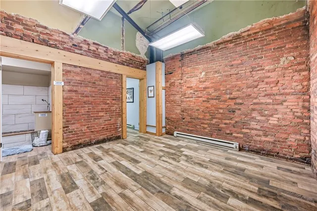 a view of outdoor space with wooden wall