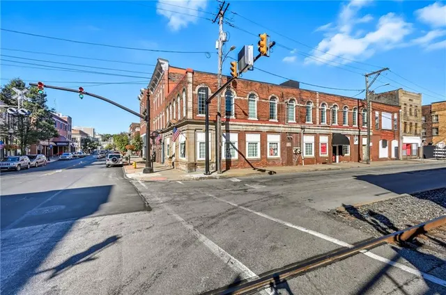 a view of a building with a street