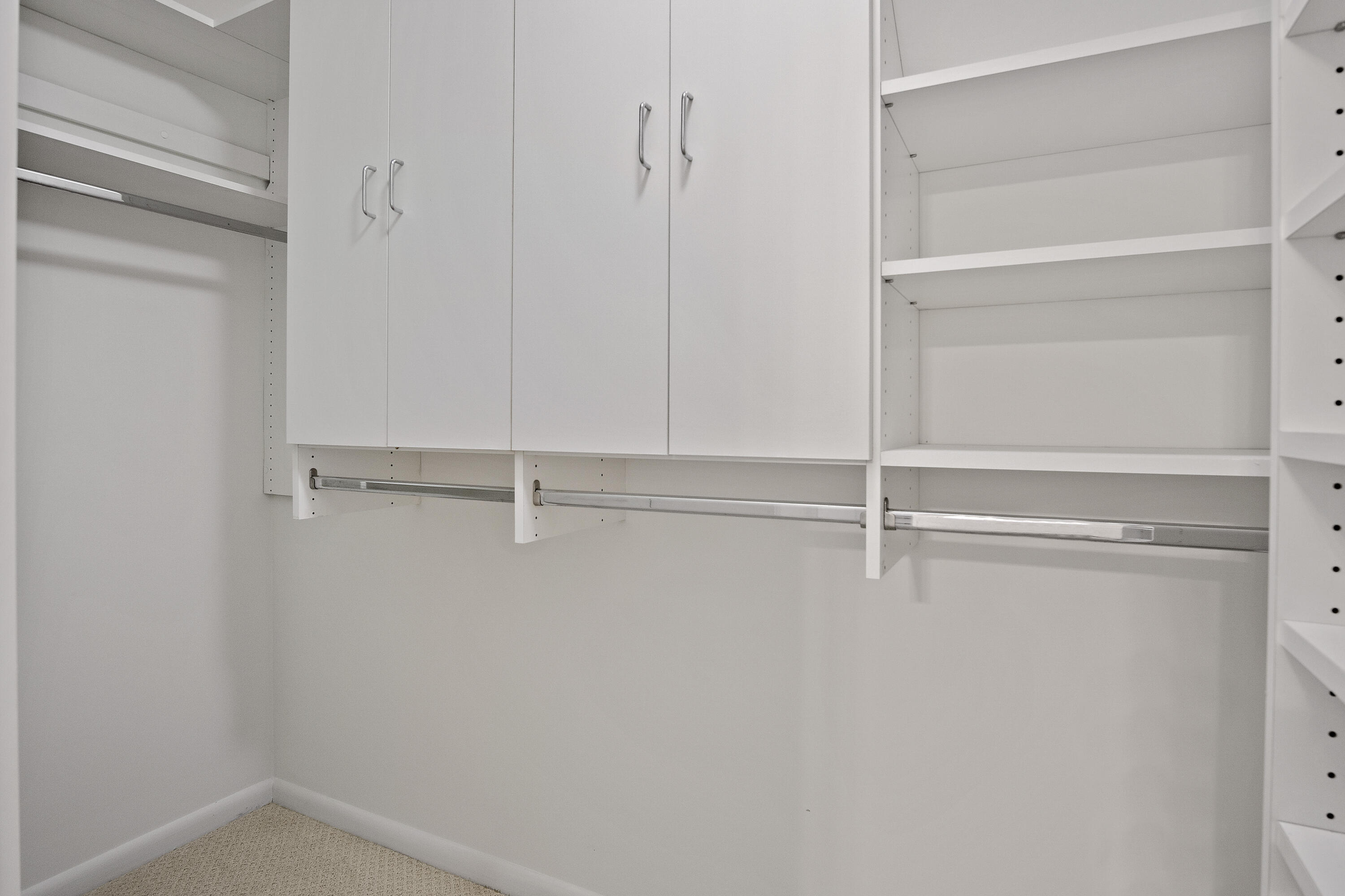 3782 Southeast Canvas Back Place Stuart, FL 34997 - Photo 11 of 19 a view of an empty walk in closet