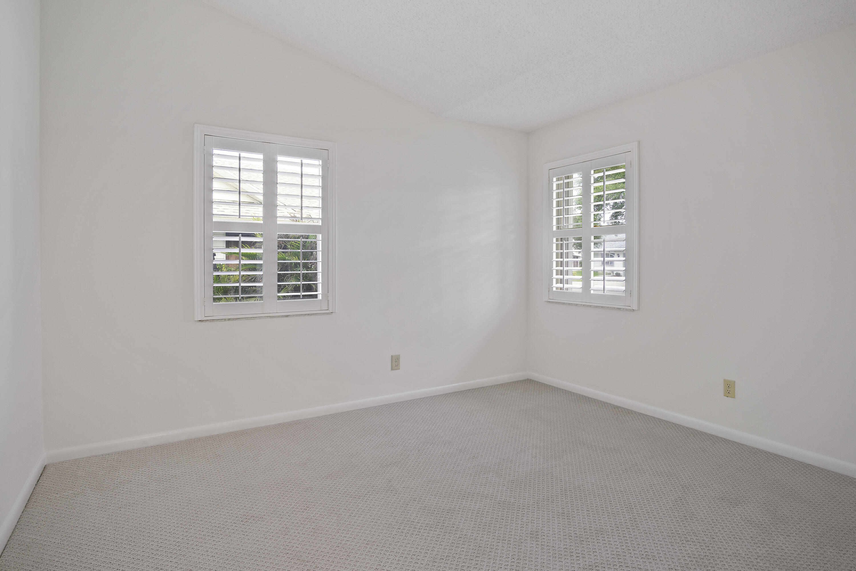 3782 Southeast Canvas Back Place Stuart, FL 34997 - Photo 12 of 19 an empty room with windows