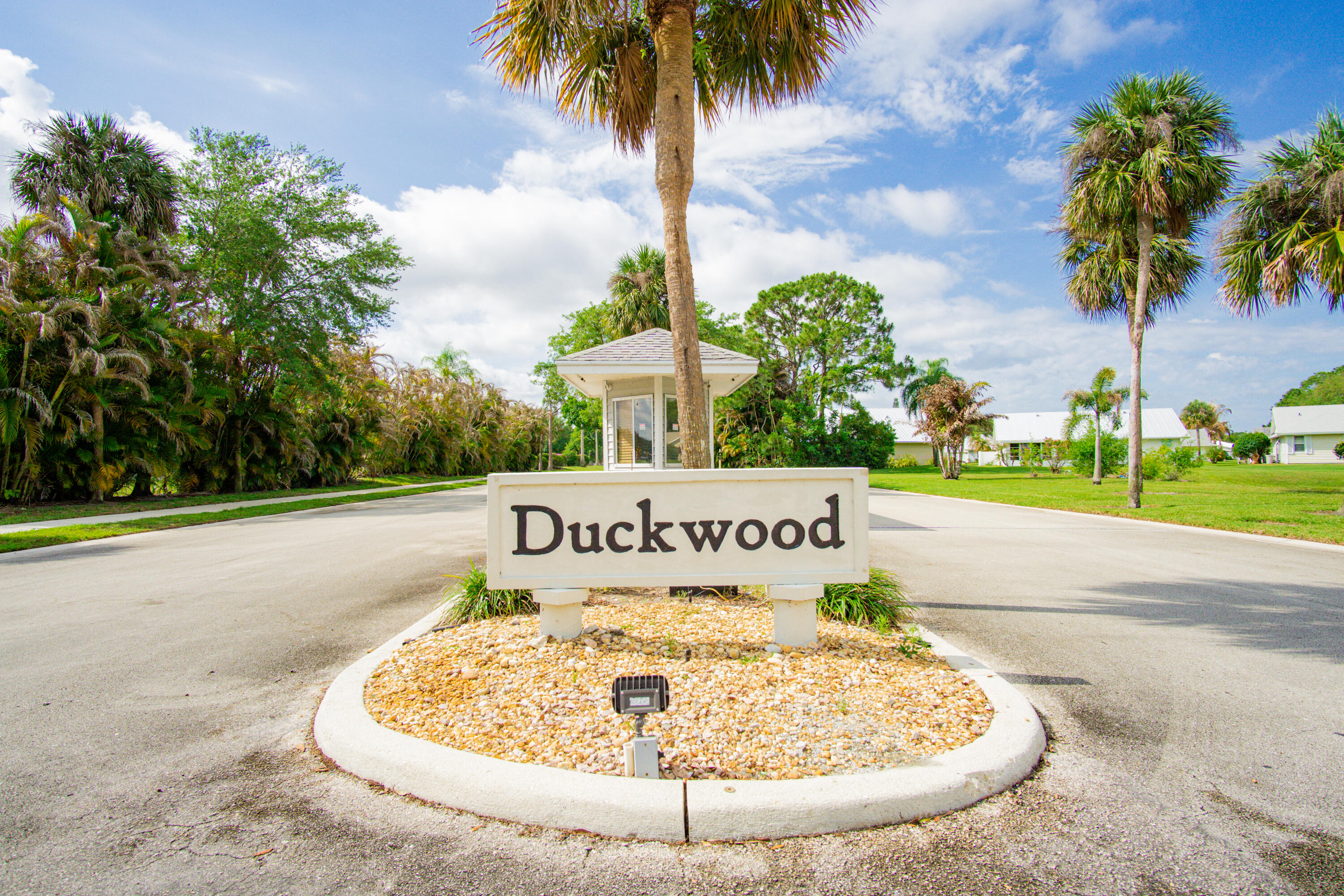 3782 Southeast Canvas Back Place Stuart, FL 34997 - Photo 19 of 19 a sign on the side of the road
