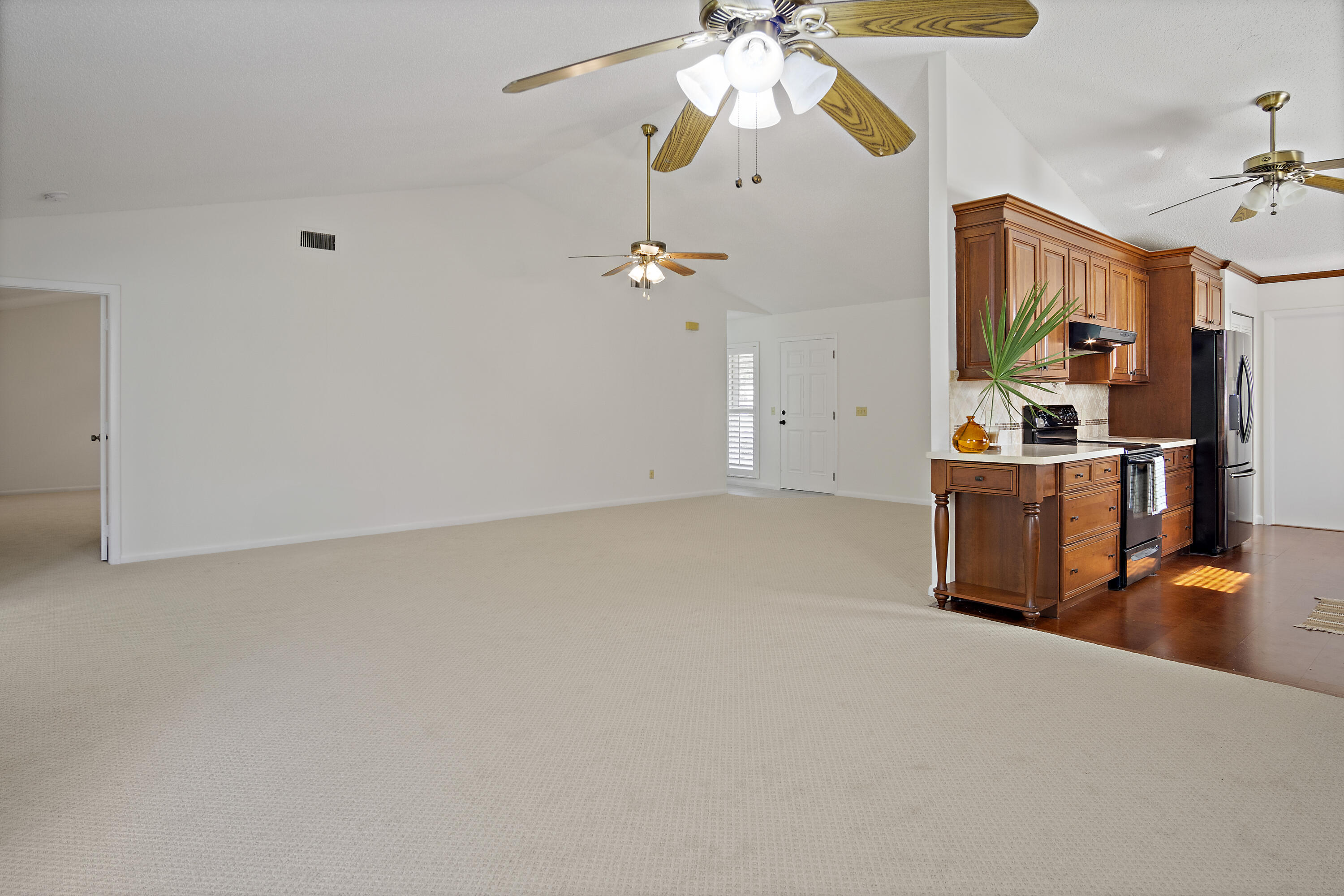 3782 Southeast Canvas Back Place Stuart, FL 34997 - Photo 2 of 19 wooden floor in an empty room