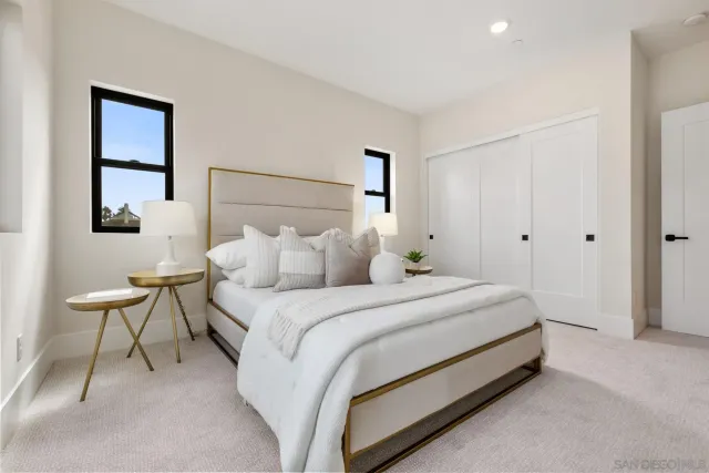 a bathroom with a double vanity sink and mirror