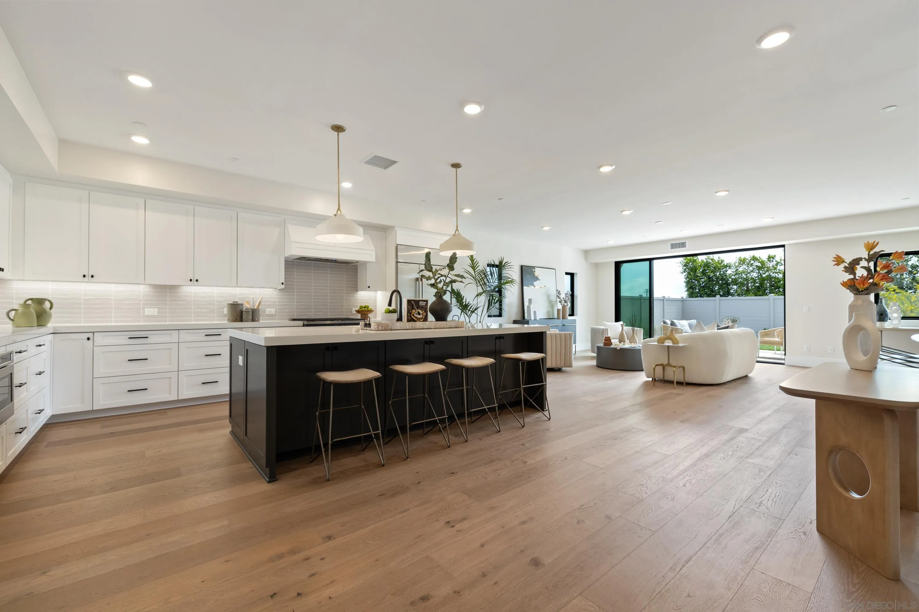 3747 Adams Street Carlsbad, CA 92008 - Photo 8 of 66 a kitchen with counter top space and living room