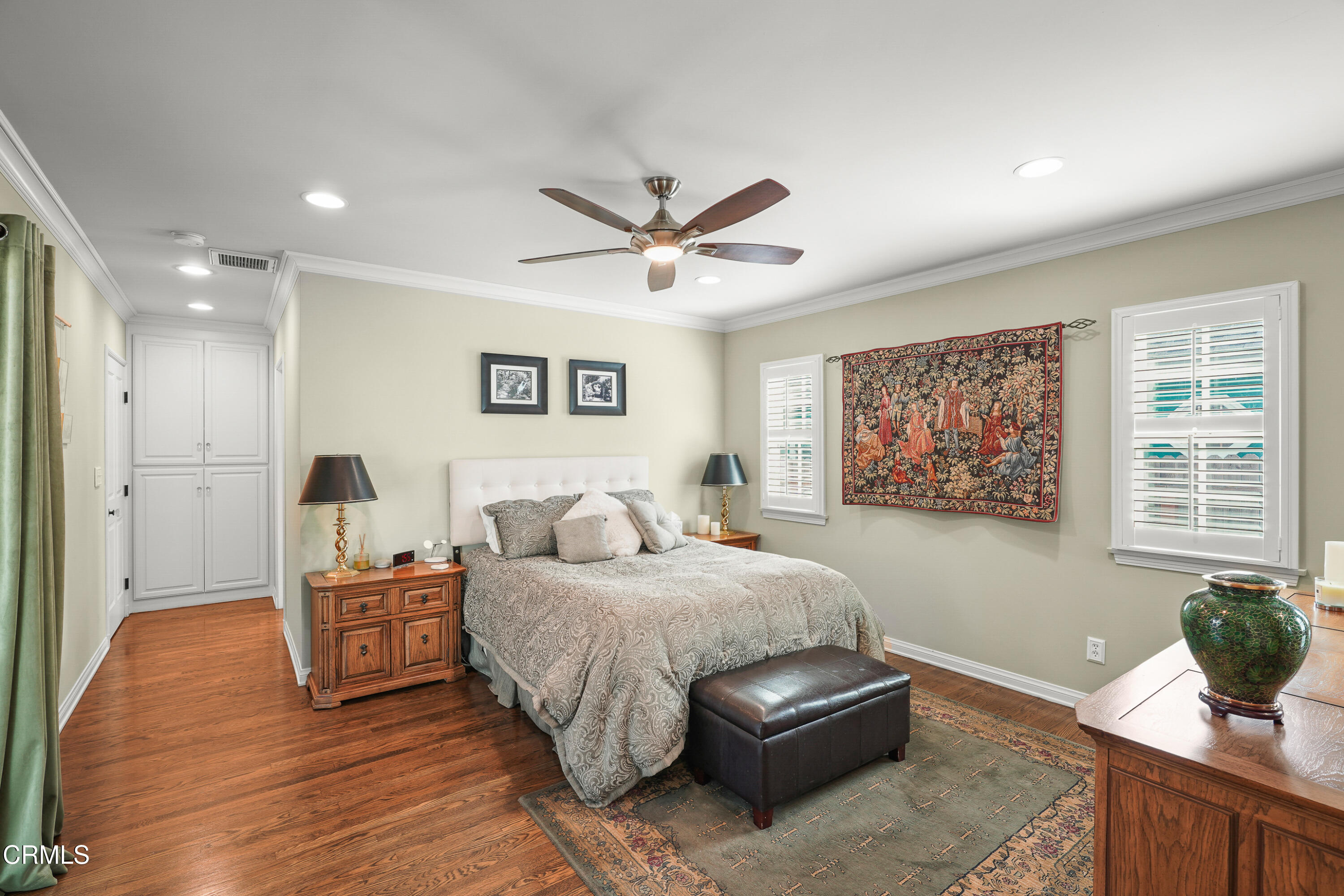 367 Northcliff Road Pasadena, CA 91107 - Photo 13 of 39 a bedroom with a bed and a chandelier