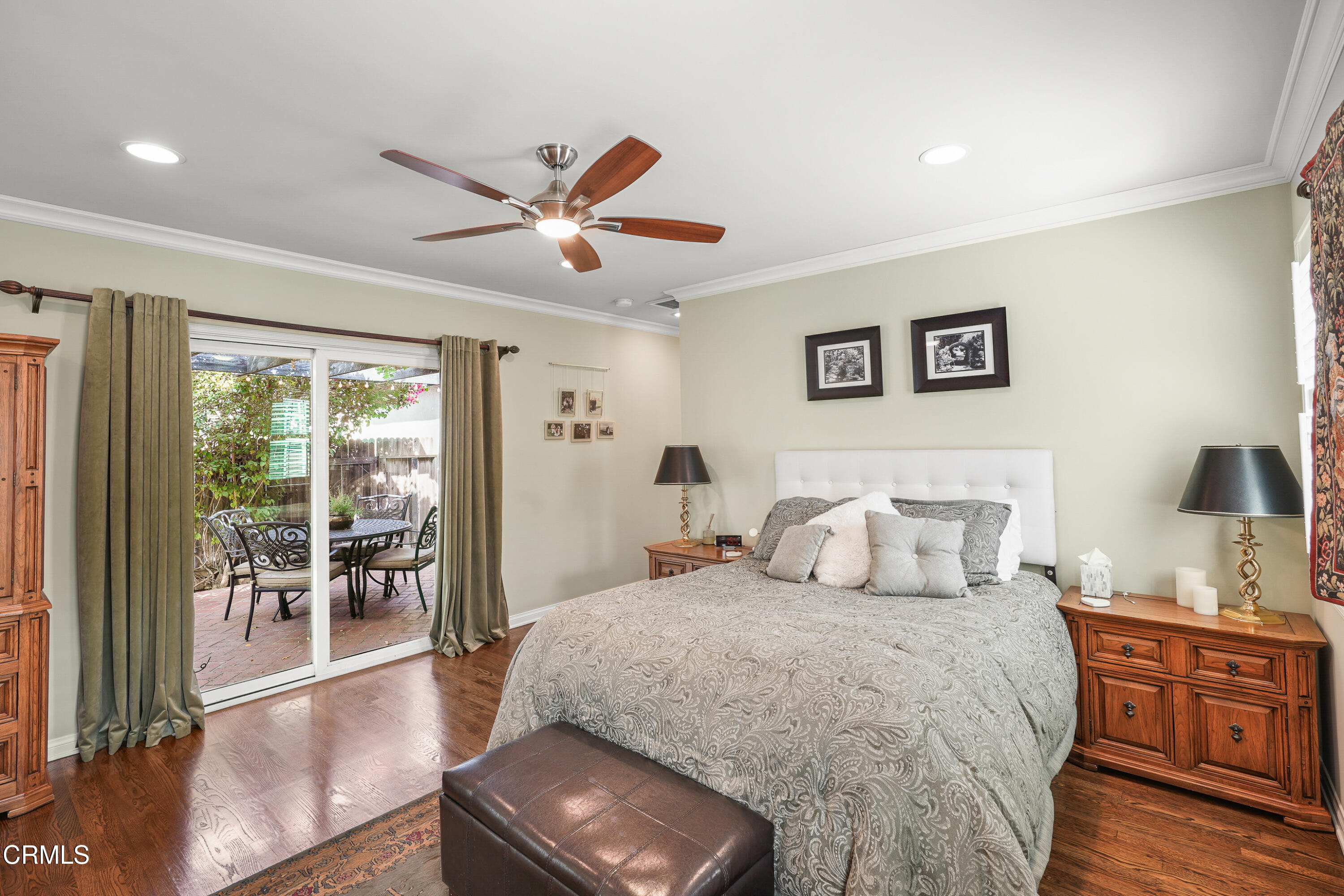 367 Northcliff Road Pasadena, CA 91107 - Photo 14 of 39 a bedroom with a large bed and a chandelier