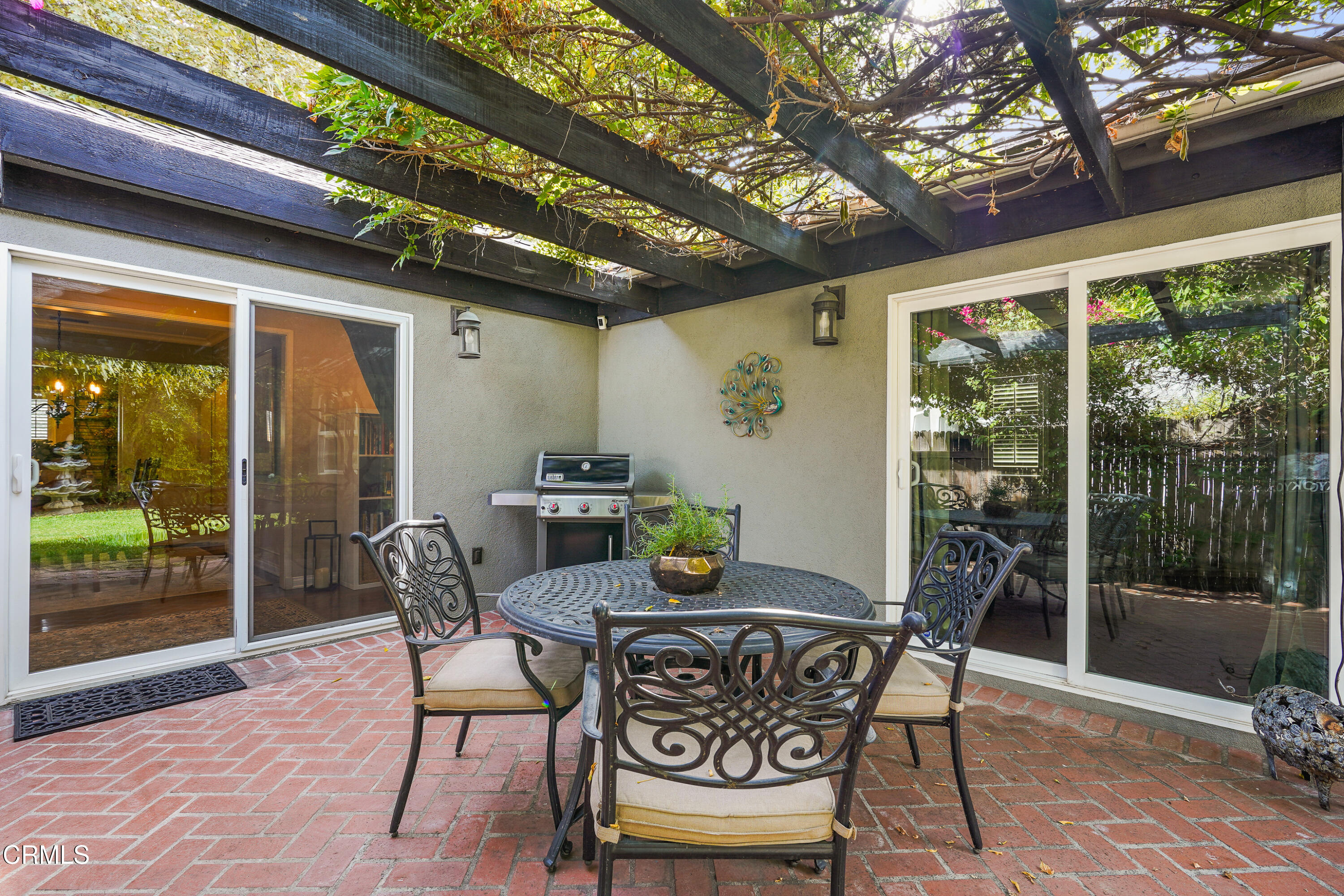 367 Northcliff Road Pasadena, CA 91107 - Photo 27 of 39 a view of an outdoor dining space with a table and chairs