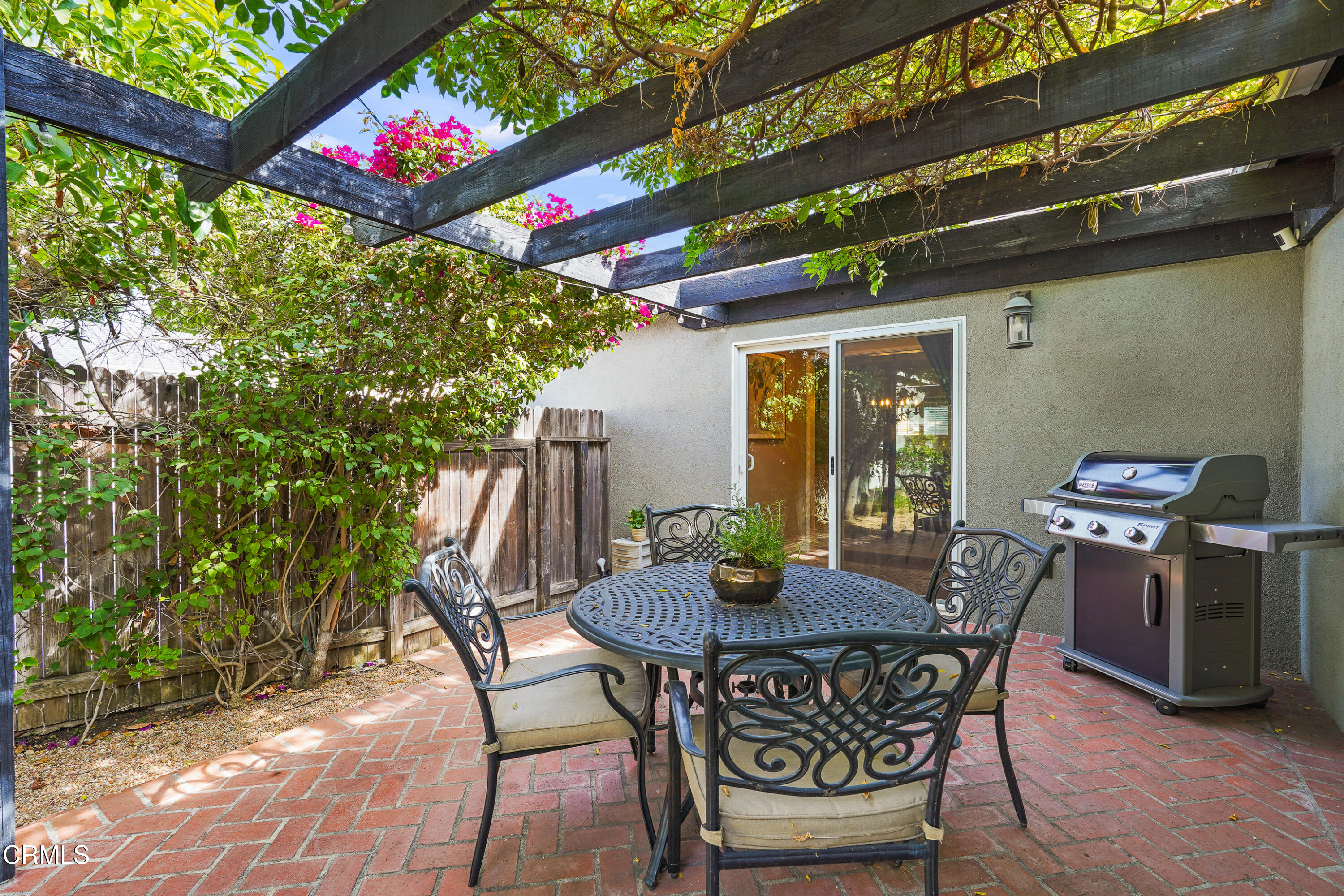 367 Northcliff Road Pasadena, CA 91107 - Photo 28 of 39 a view of an outdoor dining space with a table and chairs