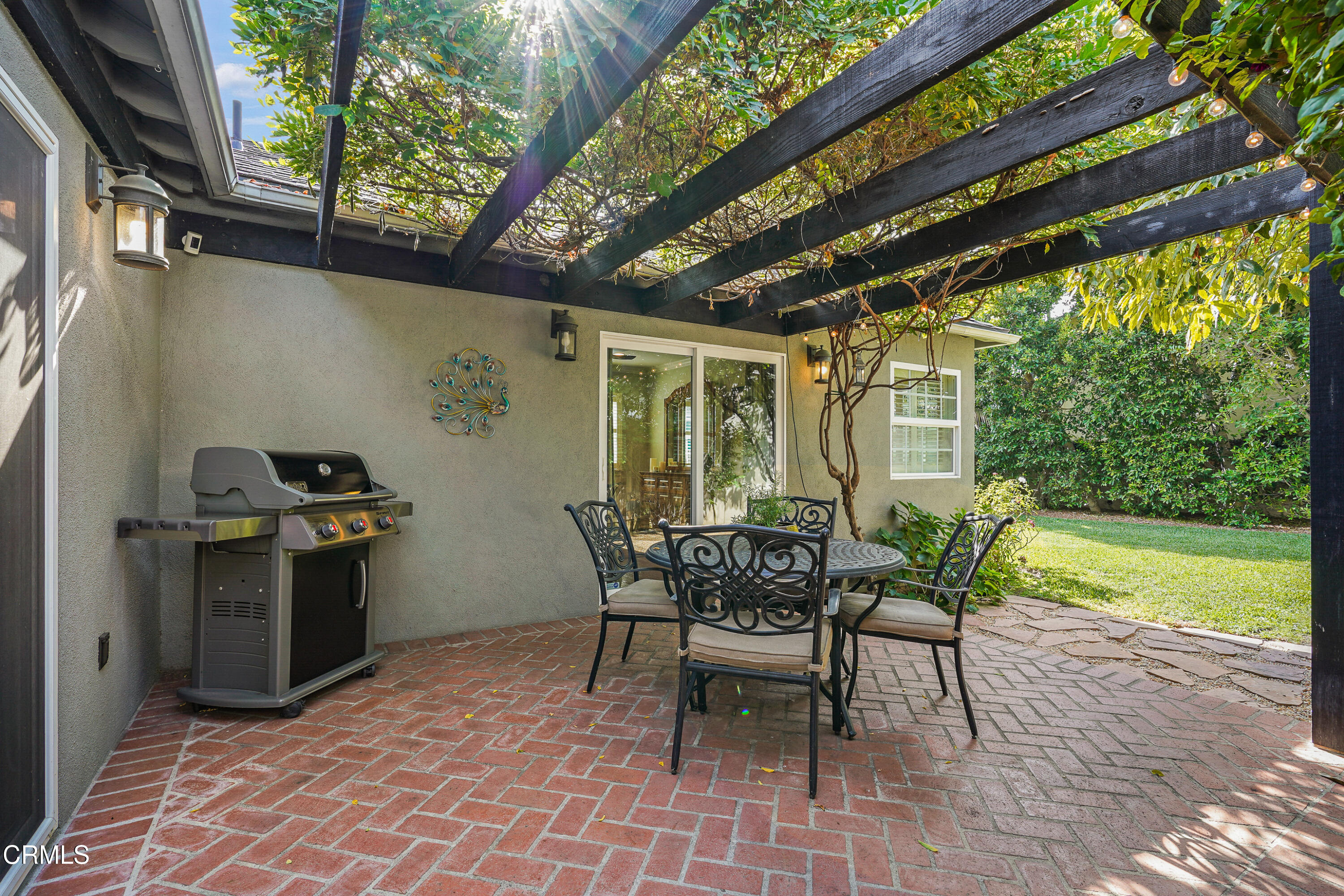 367 Northcliff Road Pasadena, CA 91107 - Photo 30 of 39 a view of a patio with table and chairs