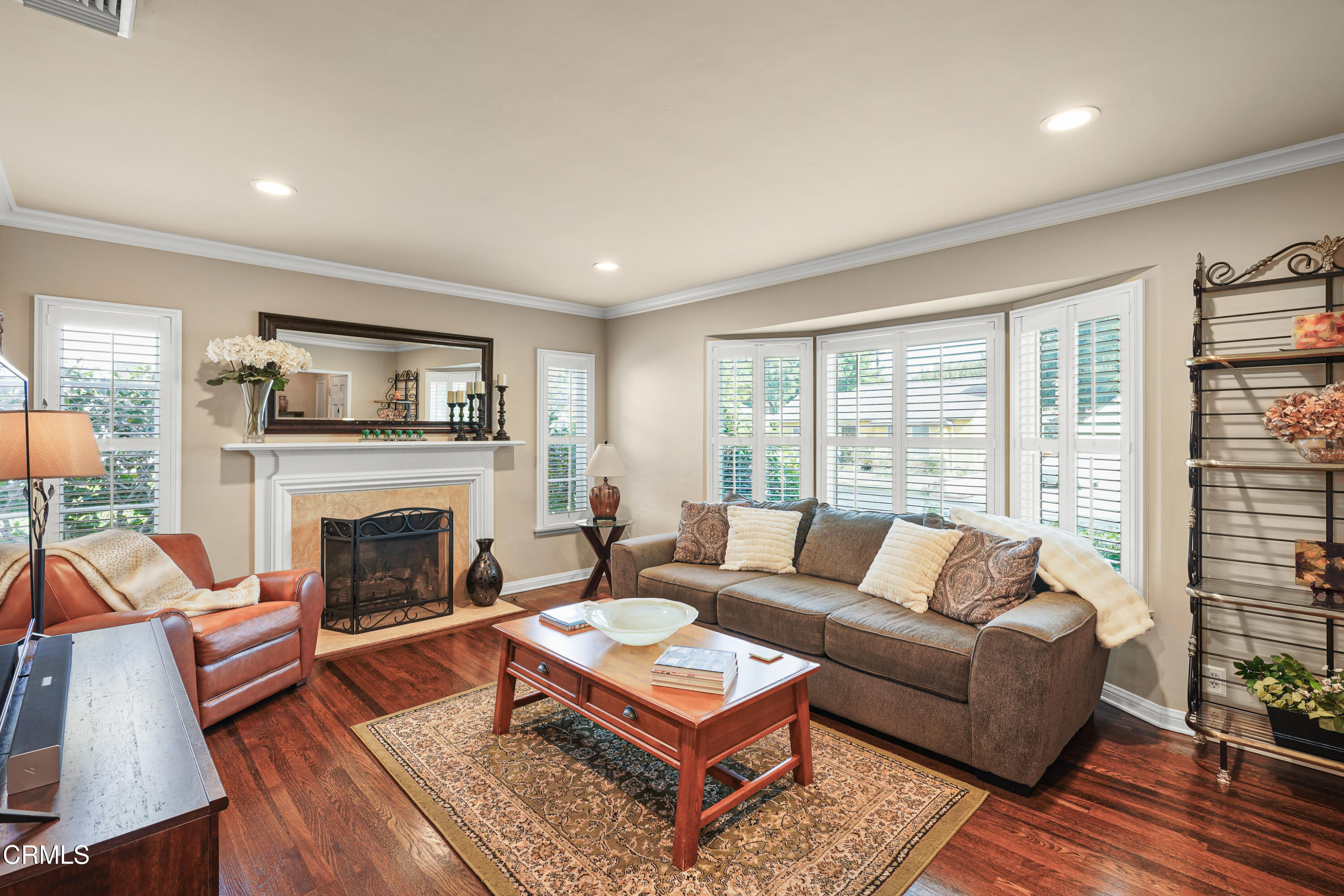 367 Northcliff Road Pasadena, CA 91107 - Photo 3 of 39 a living room with furniture and a fireplace