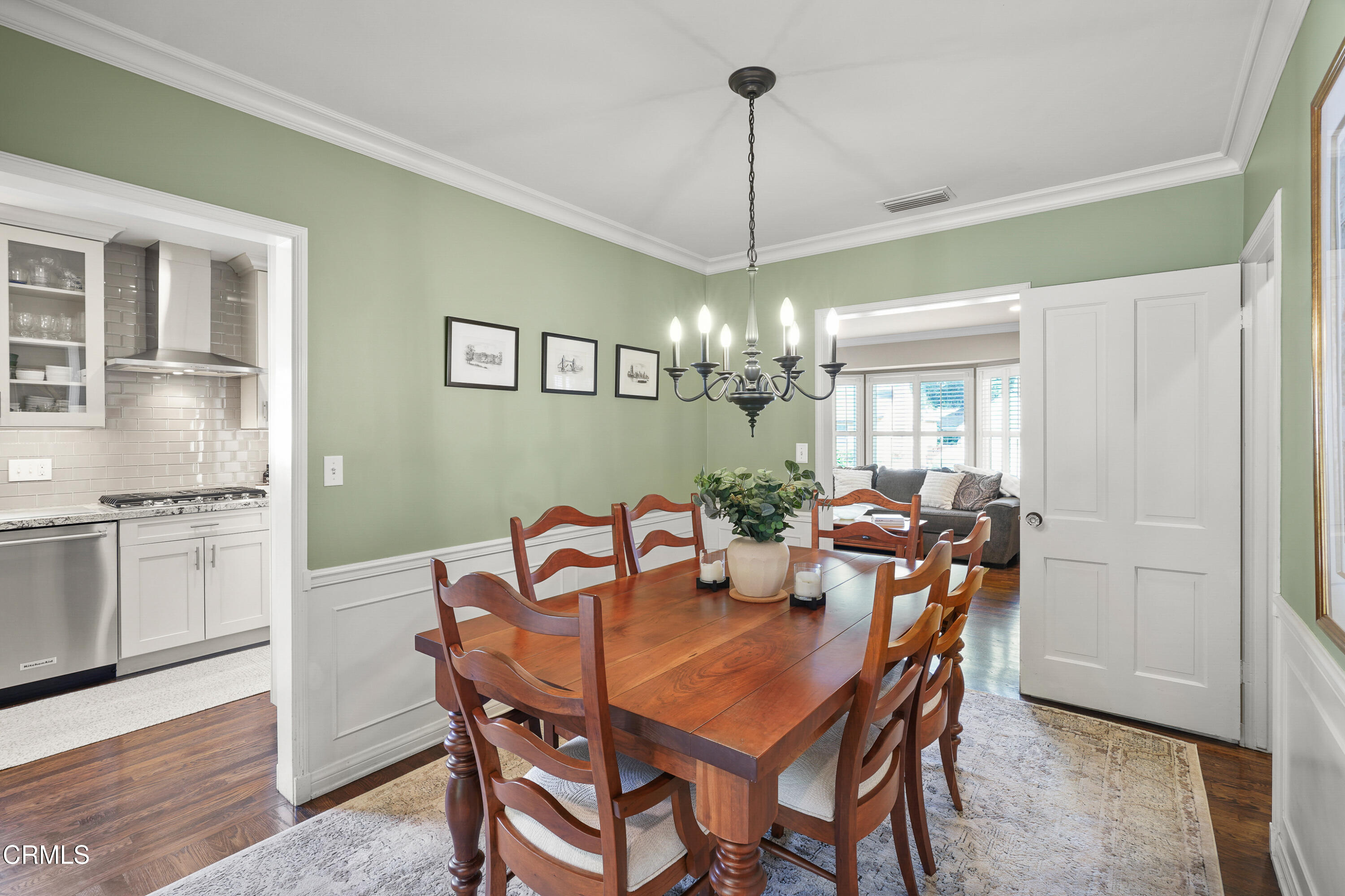 367 Northcliff Road Pasadena, CA 91107 - Photo 6 of 39 a view of a dining room with furniture a chandelier and wooden floor