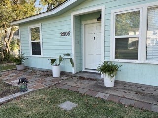 2005 Magnolia Drive La Marque, TX 77568 - Photo 3 of 15 a front view of a house with garden