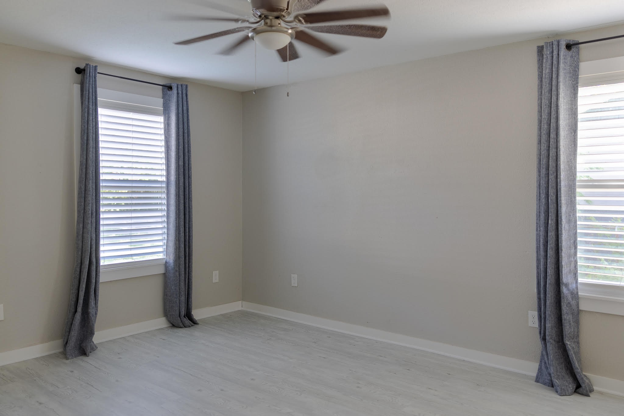 2005 Magnolia Drive La Marque, TX 77568 - Photo 10 of 15 an empty room with windows and fan