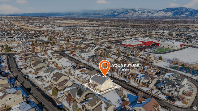 14714 South Bright Wood Road Herriman, UT 84096 - Photo 5 of 41 Aerial perspective of suburban area with a mountainous background