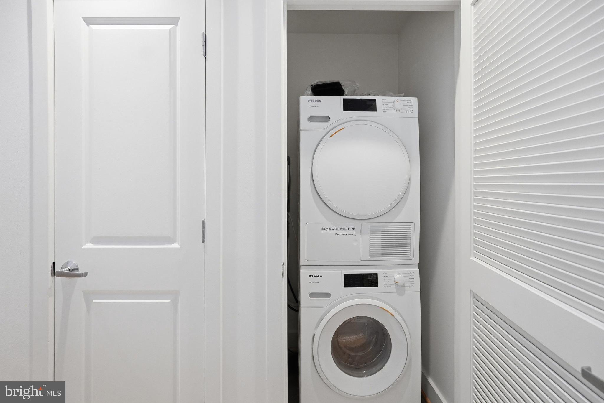 1209 13th Street Northwest, Unit 208 Washington, DC 20005 - Photo 14 of 22 a utility room with dryer and washer