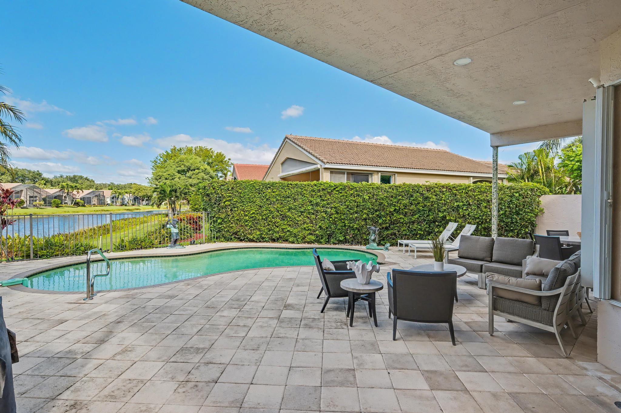 6416 Punta Rosa Drive Delray Beach, FL 33446 - Photo 25 of 37 pool to lake