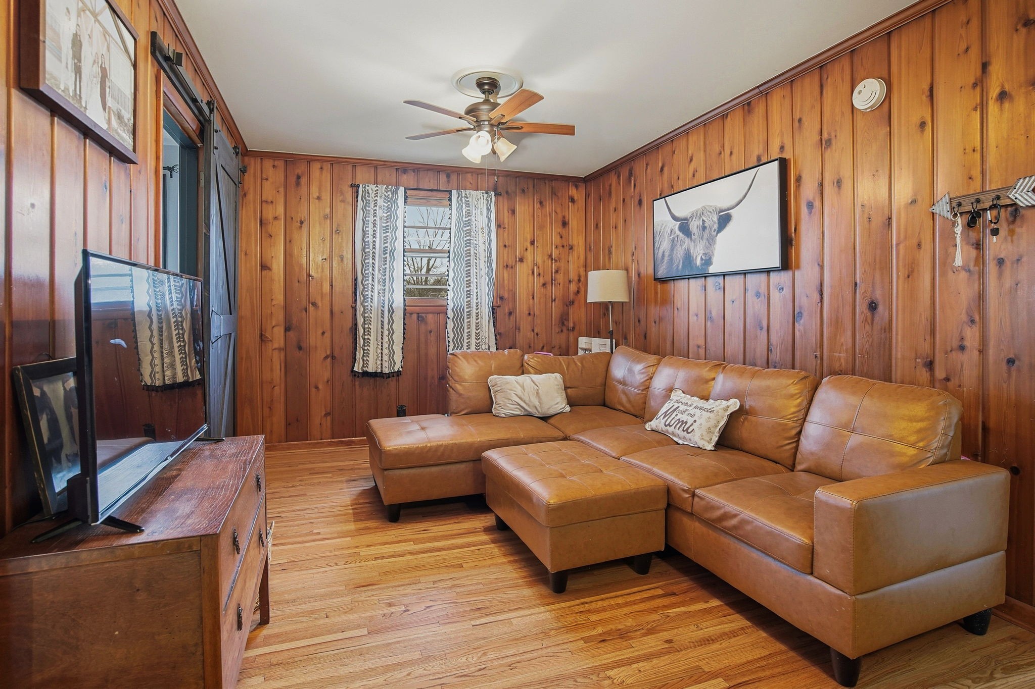 608 Hamblen Drive Madison, TN 37115 - Photo 12 of 27 a living room with furniture ceiling fan and a wooden floor