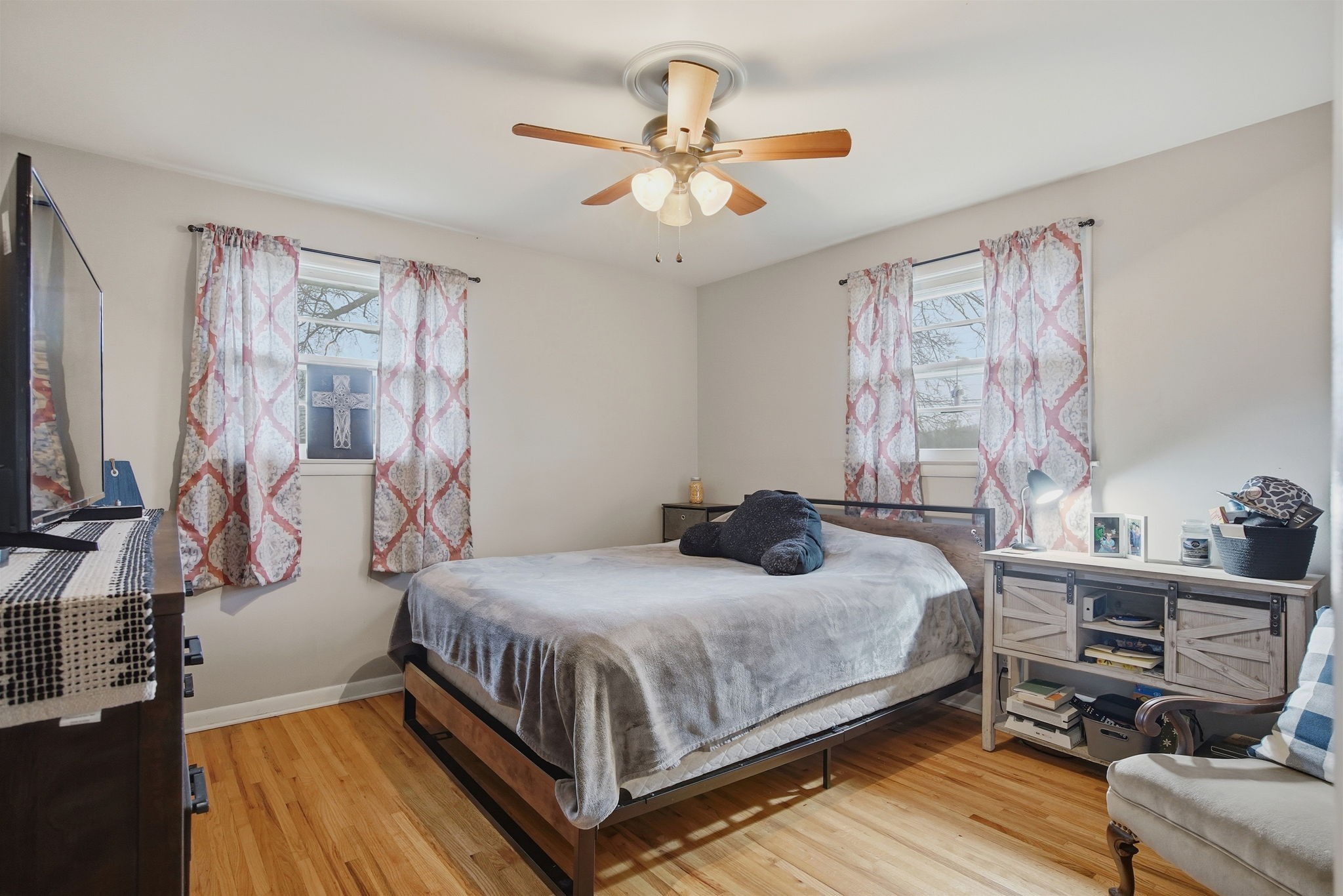 608 Hamblen Drive Madison, TN 37115 - Photo 17 of 27 a bedroom with a bed and a chandelier