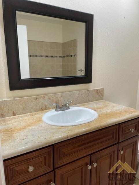 Undisclosed Address Bakersfield, CA 93311 - Photo 17 of 20 a bathroom with a sink and a mirror