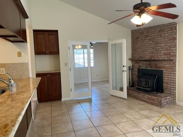 Undisclosed Address Bakersfield, CA 93311 - Photo 8 of 20 a bathroom with a granite countertop sink and shower