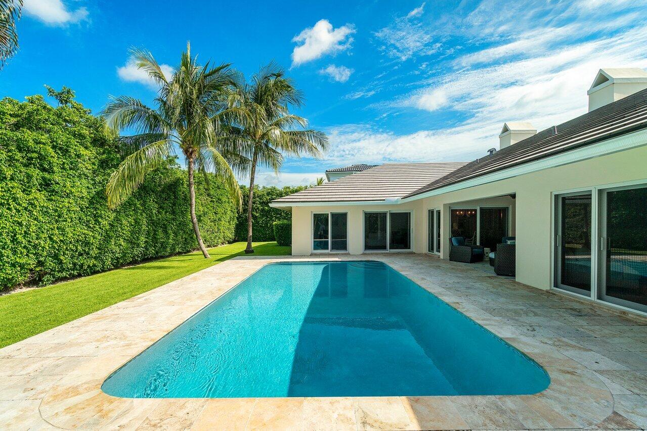 2377 East Silver Palm Road Boca Raton, FL 33432 - Photo 1 of 40 a view of a house with a swimming pool