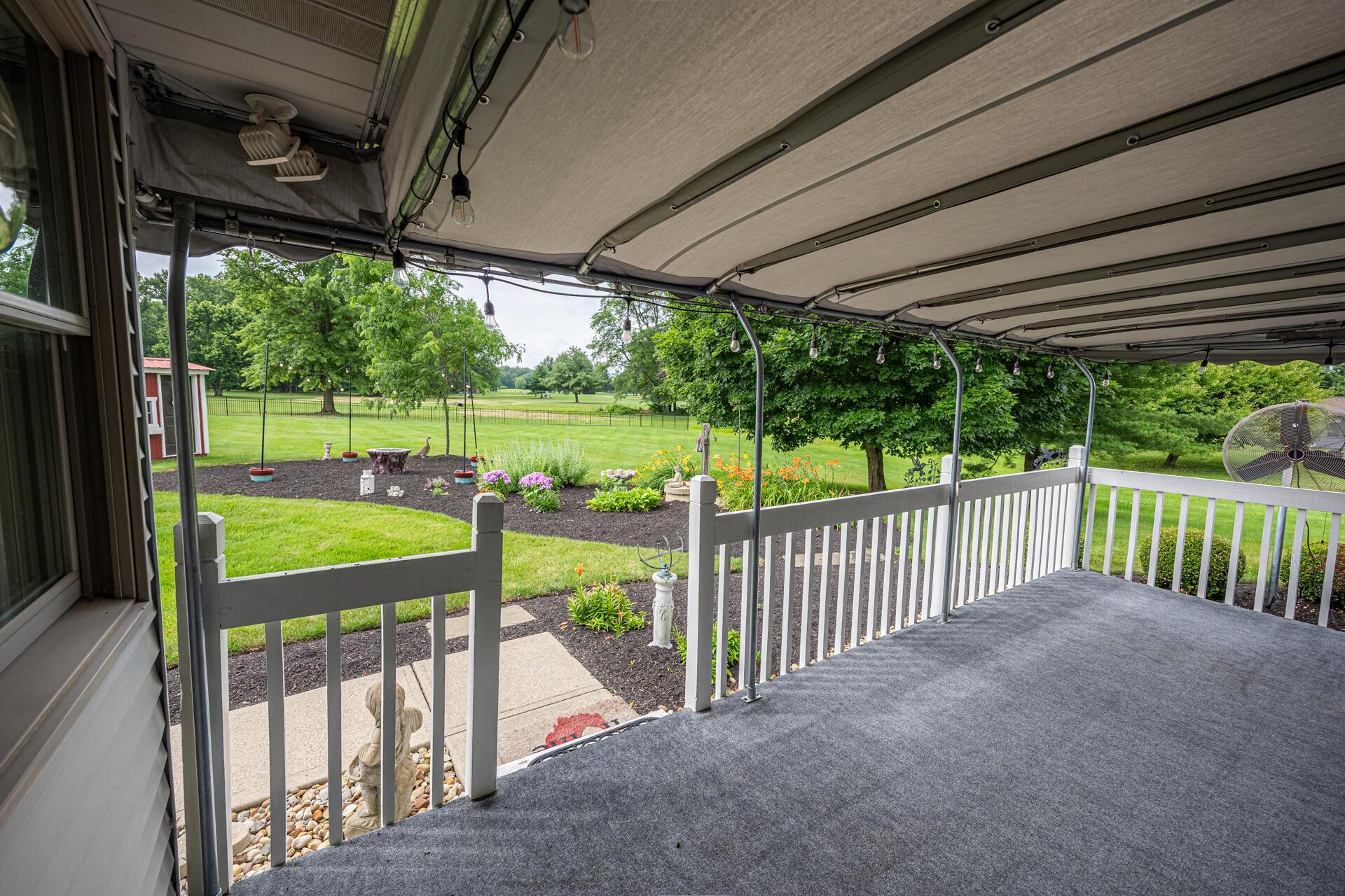 3084 Columbus Road Centerburg, OH 43011 - Photo 33 of 42 rear covered porch