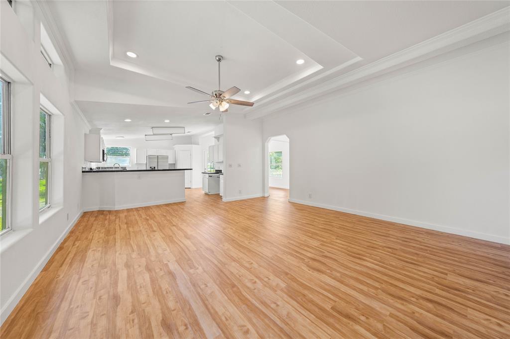 429 Eagle Ridge Road McGregor, TX 76657 - Photo 8 of 40 a view of a kitchen with a wooden floor