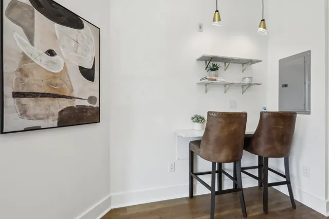 a view of kitchen with table and chair