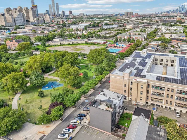 a view of a city with tall buildings