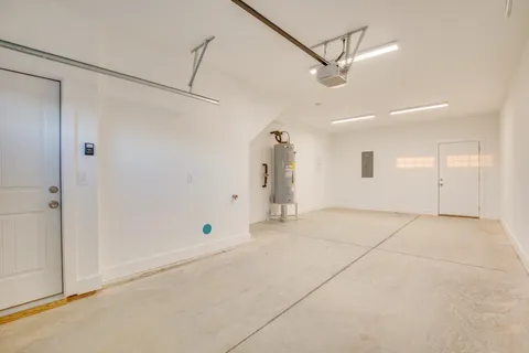a view of a livingroom with a ceiling fan and window