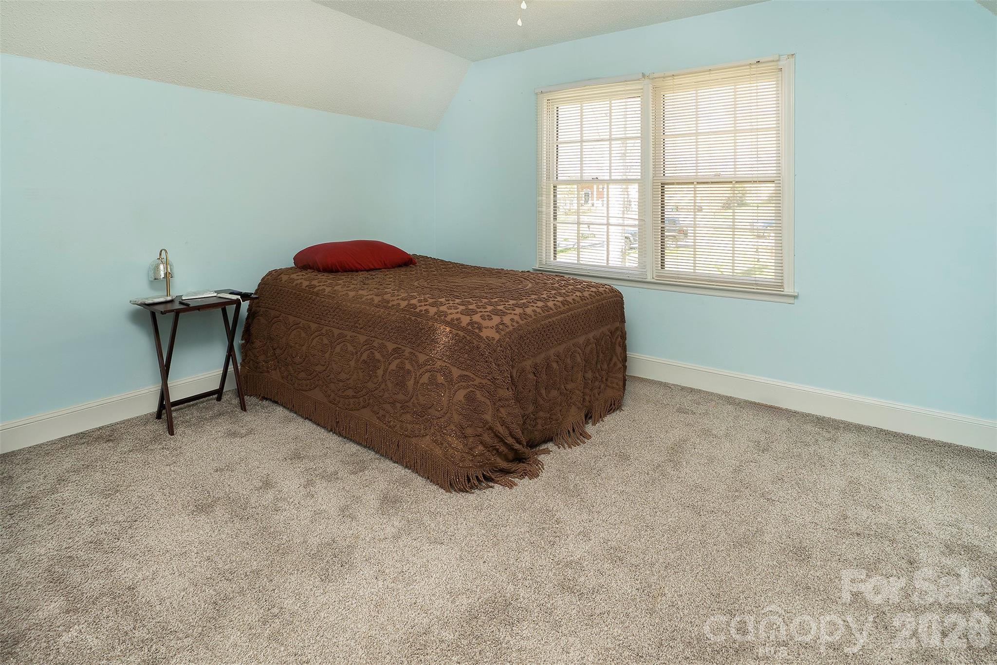 5332 Quail Ridge Drive Mint Hill, NC 28227 - Photo 13 of 22 a spacious bedroom with a bed and a window