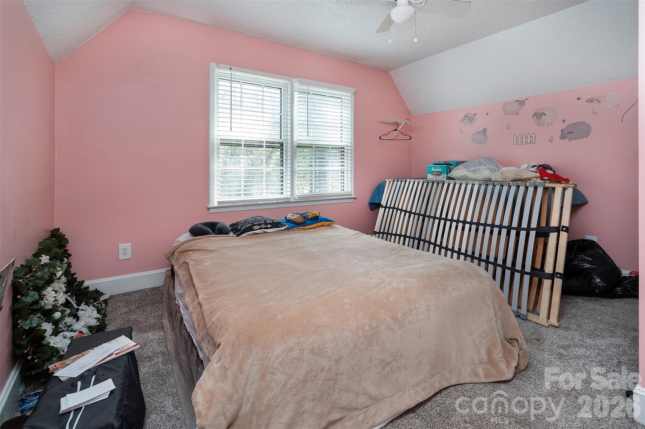 5332 Quail Ridge Drive Mint Hill, NC 28227 - Photo 15 of 22 a bedroom with a bed and a window