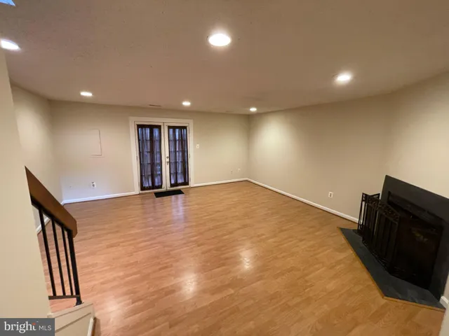 a balcony with table and chairs