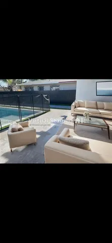 a room with furniture and a window