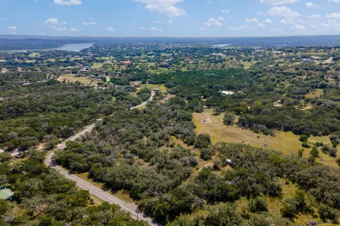 an aerial view of residential house and outdoor space