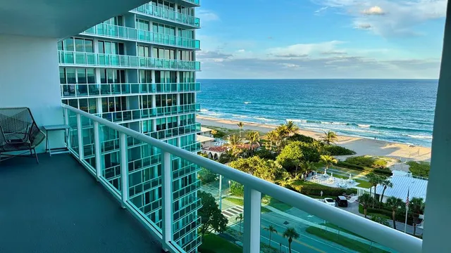 a view of a lake with a yard