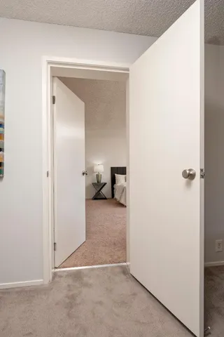 a view of a room with a wardrobe space