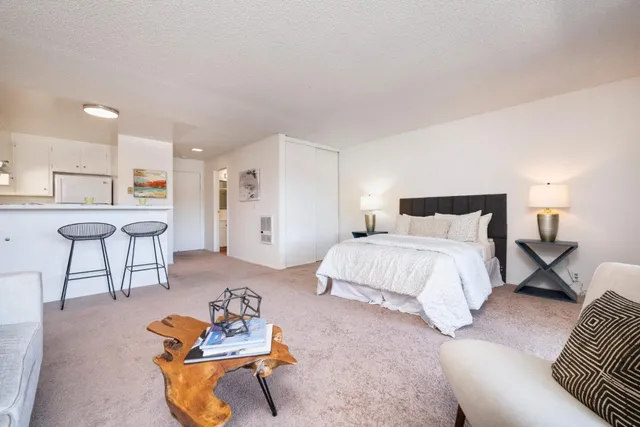 a bedroom with furniture and a couch