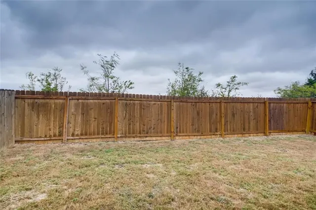 a view of wooden fence
