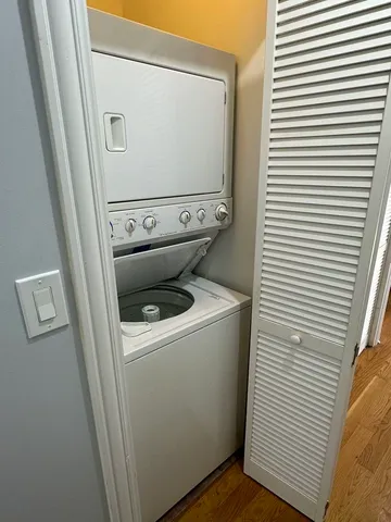 a view of bathroom with washer and dryer