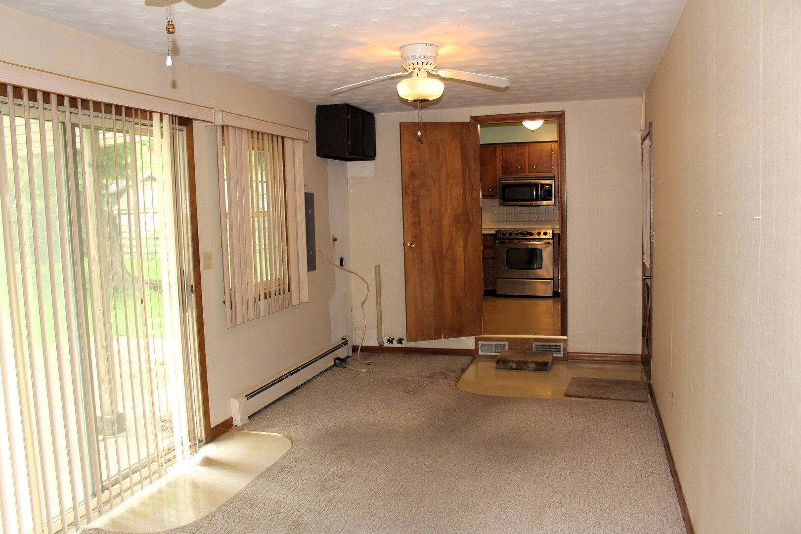 55 Hillcrest Drive Clinton, IL 61727 - Photo 11 of 22 a view of a room with gym equipment
