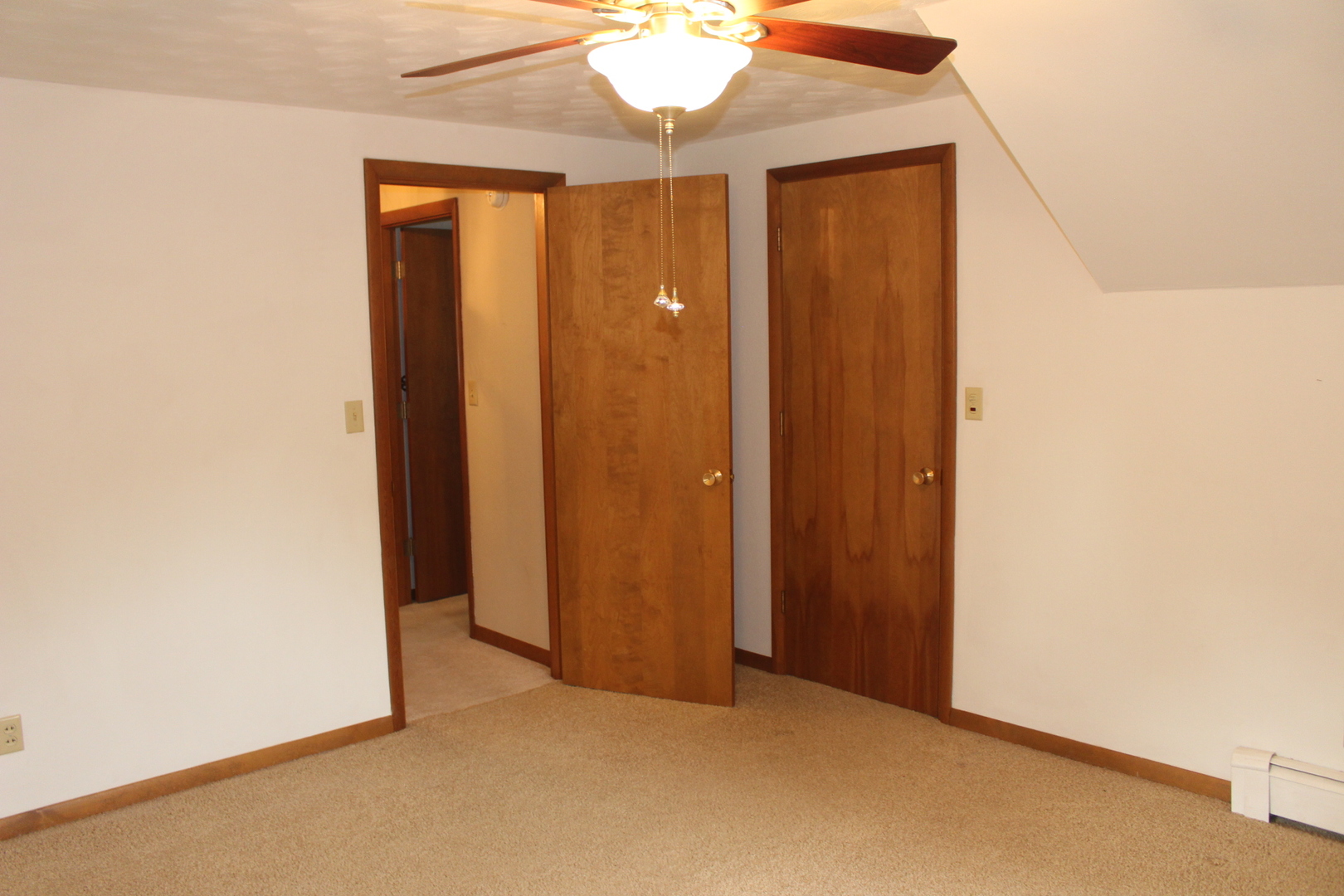 55 Hillcrest Drive Clinton, IL 61727 - Photo 14 of 22 an empty room with chandelier fan