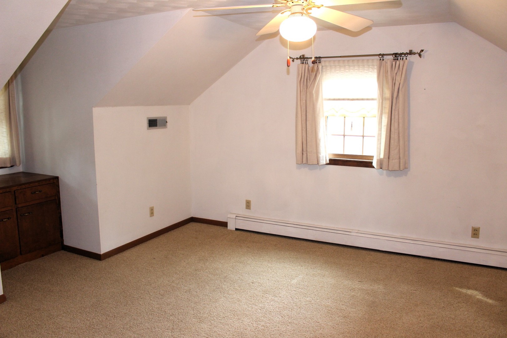 55 Hillcrest Drive Clinton, IL 61727 - Photo 16 of 22 an empty room with a window