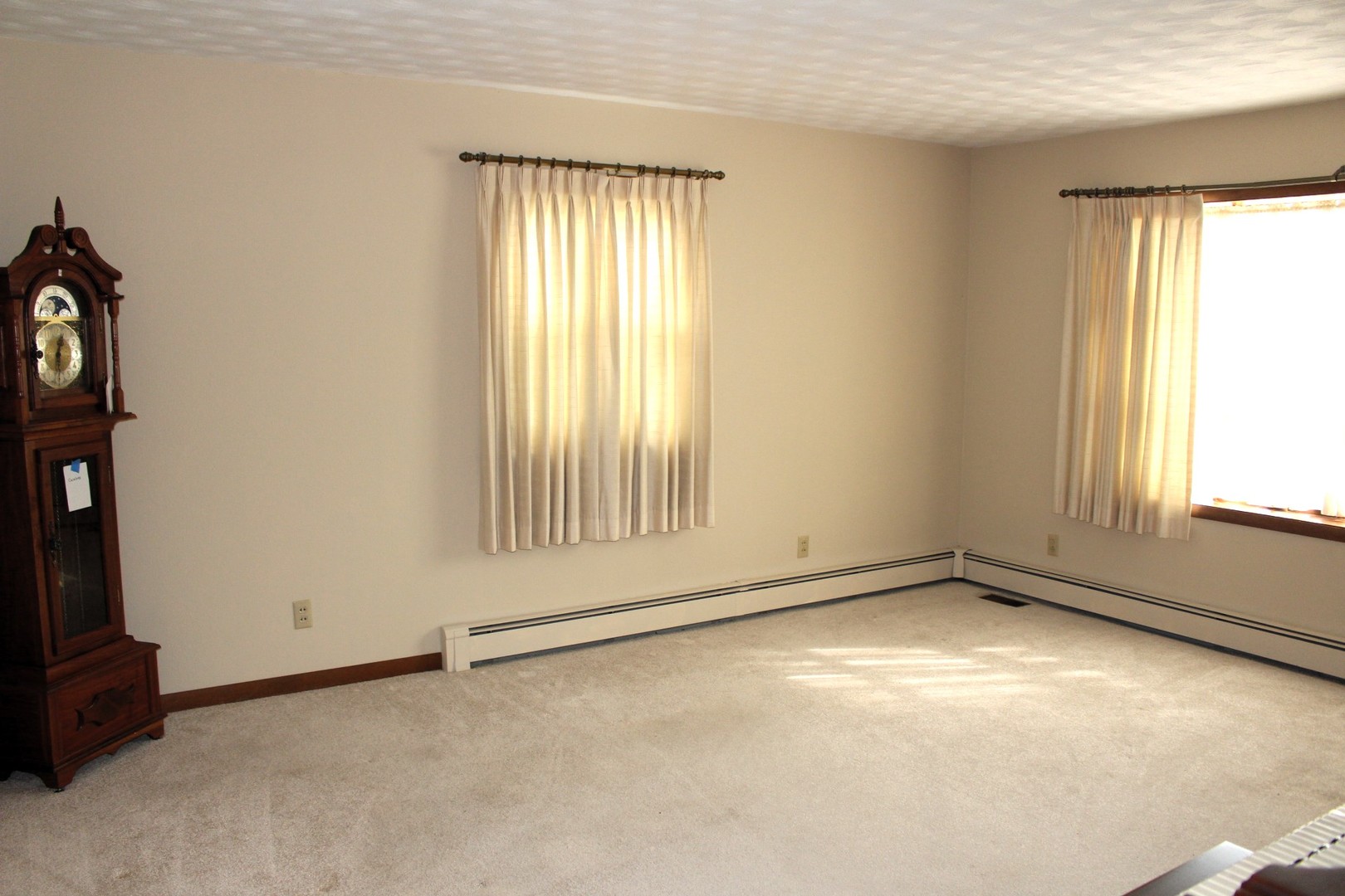 55 Hillcrest Drive Clinton, IL 61727 - Photo 4 of 22 an empty room with windows