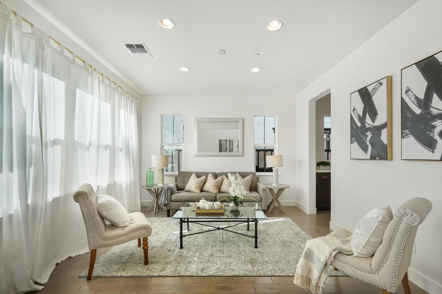 1237 Viognier Way Gilroy, CA 95020 - Photo 14 of 47 a living room with furniture and a large window