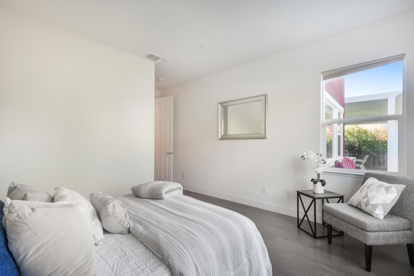 1237 Viognier Way Gilroy, CA 95020 - Photo 26 of 47 a bedroom with a bed and a couch