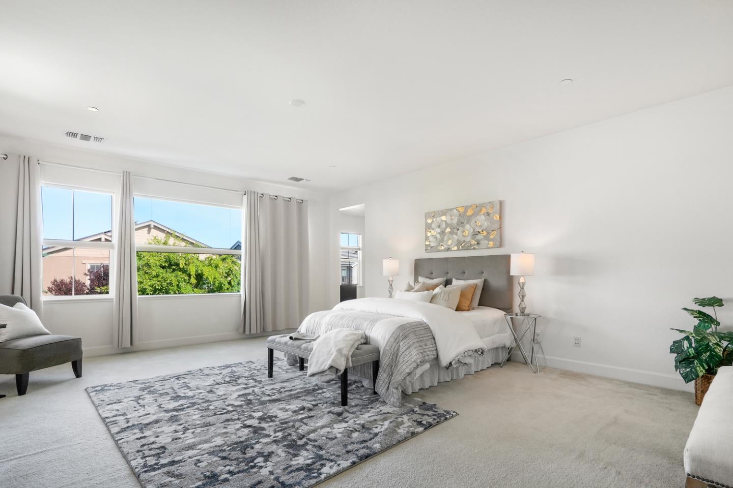 1237 Viognier Way Gilroy, CA 95020 - Photo 30 of 47 a bed room with a bed and a couch